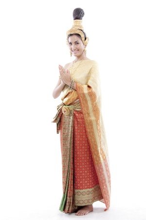 Thai woman greets with her thai costume の写真素材
