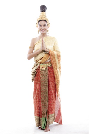 Thai woman greets on a thai costumeの写真素材