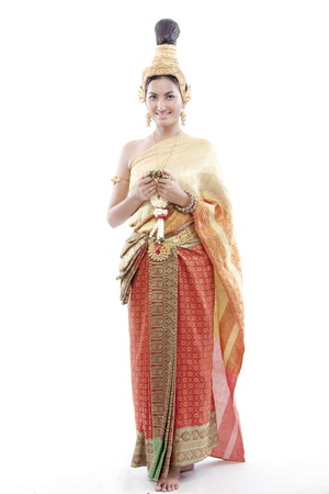 Thai woman greets on a thai costumeの写真素材