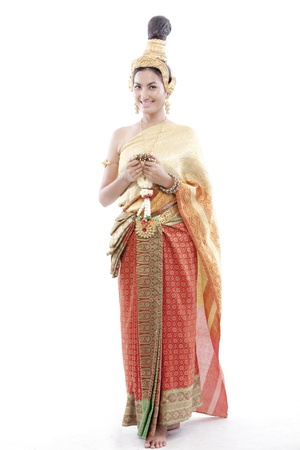 Thai woman greets on a thai costumeの写真素材