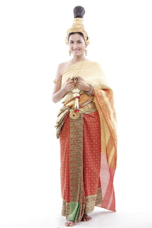 Thai woman greets on a thai costumeの写真素材