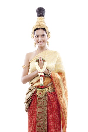 Thai woman greets on a thai costume の写真素材