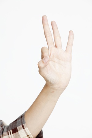 Female hand showing approval gestureの写真素材