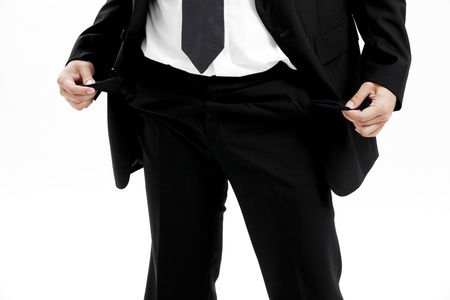 Businessman with emptied out pocketsの写真素材