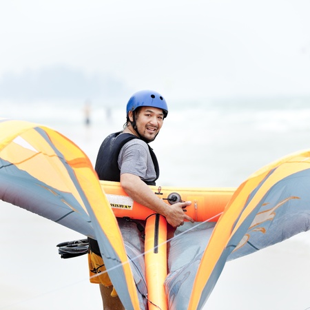 Man getting ready for kite surfing