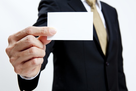Businessman holding a blank business cardの写真素材
