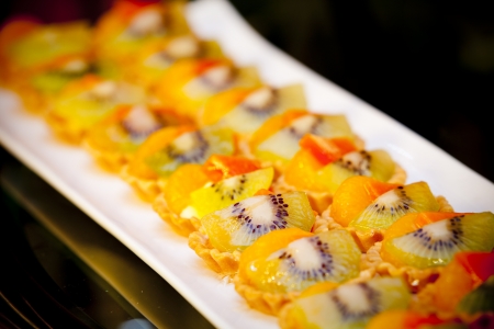 Fruit tarts as dessert at wedding reception の写真素材