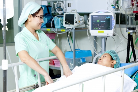 Nurse with patient on a gurneyの写真素材