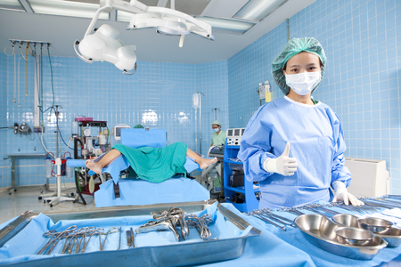 Nurse in an operating room showing thumbs upの写真素材