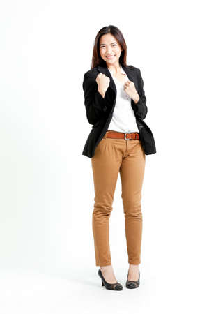 Pretty Asian woman with clenched fistsの写真素材
