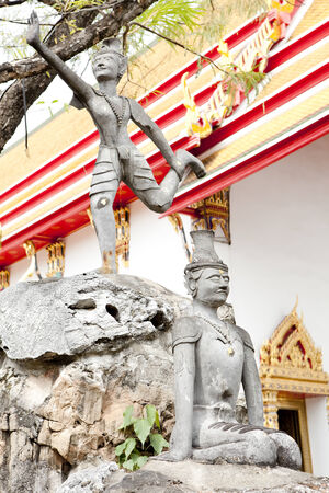 Two ancient statue models at Thailandの写真素材