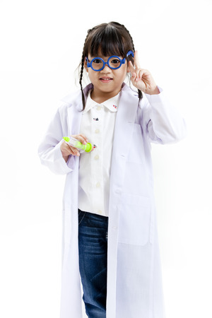 Girl holding a syringe and showing peace signの写真素材