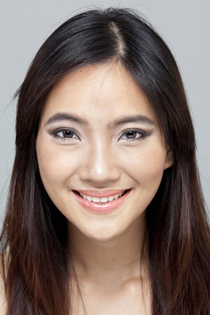 Closeup of young woman smilingの写真素材
