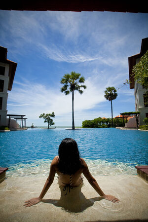 Young woman in bikini sunbathingのeditorial素材