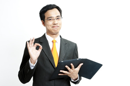 Businessman showing OK gestureの写真素材