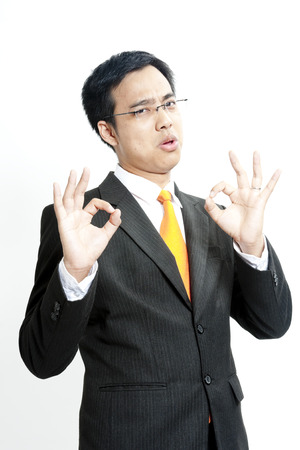 Businessman showing OK gestureの写真素材