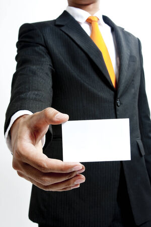 Businessman showing a blank cardの写真素材