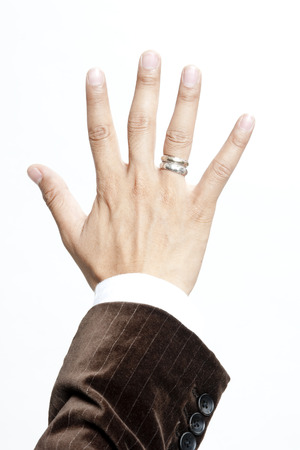 Businessman showing the number 5の写真素材