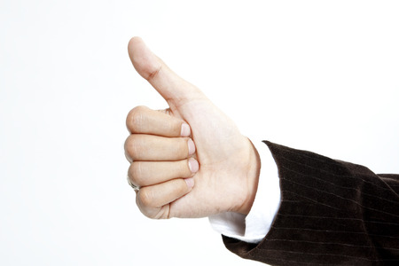 Businessman with thumbs upの写真素材