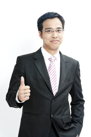 Businessman with thumbs upの写真素材