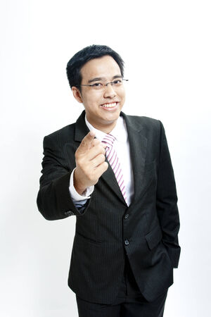 Businessman pointing at cameraの写真素材