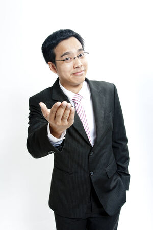 Businessman with palm outの写真素材