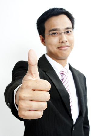 Businessman with thumbs upの写真素材