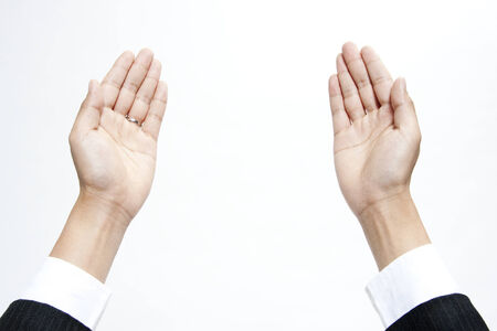 Businessman with two open palmsの写真素材