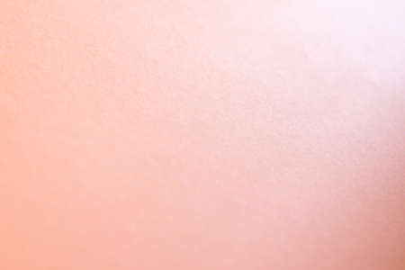 Orange Paper Background. Colorful Paper texture And there is light in the cornerの写真素材