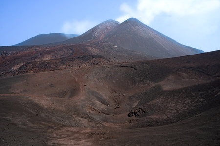 The otherwordly landscape of the Etna volcano with some smaller craters.の写真素材