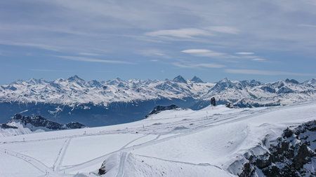 Beautiful panoramic view of the mountains on a sunny winter dayの写真素材