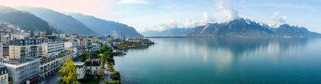 Panoramic view of the Montreux, Switzerland, lake Lec Leman and mountains in the backgroundの写真素材