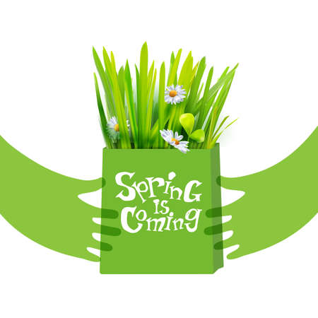 Spring is coming creative concept. Green package with realistic grass and flowers at flat drawn hands. Bag with grass. Season vector illustration with hand drawing spring lettering.のイラスト素材