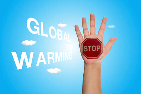 Educational and Creative composition with the message Stop Global Warming on beautiful skyの写真素材
