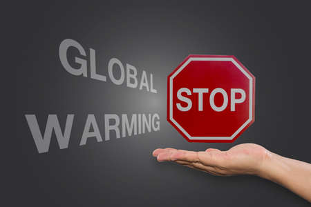 Educational and Creative composition with the message Stop Global Warming on the blackboardの写真素材
