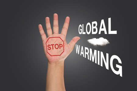 Educational and Creative composition with the message Stop Global Warming on the blackboardの写真素材