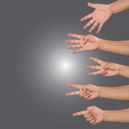 One to five fingers count signs isolated over gray backgroundの写真素材