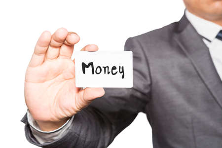 Handsome businessman holding business card close up , business idea conceptの写真素材