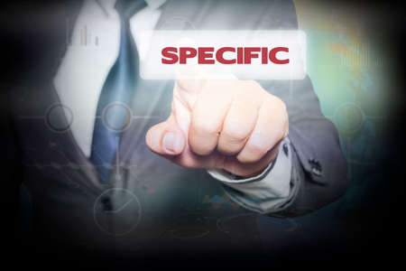 Businessman pressing button on touch screen interface and select SPECIFIC. Business conceptの写真素材