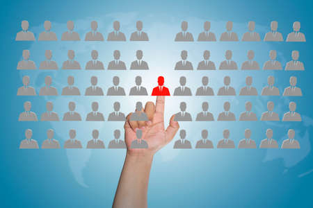 Businessman hand pointing to human icon - business abstract - HR, HRM, HRD ,CRM conceptの写真素材