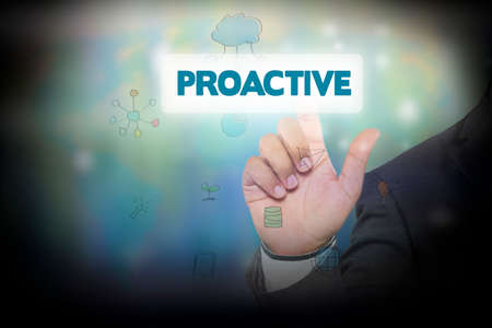 Businessman pressing button on touch screen interface and select PROACTIVE. Business conceptの写真素材