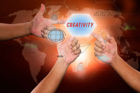 pressing touch screen interface and select "CREATIVITY", business concept , business ideaの写真素材