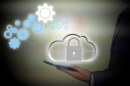 Businessman holding a tablet with internet security concept. information security. data security.
