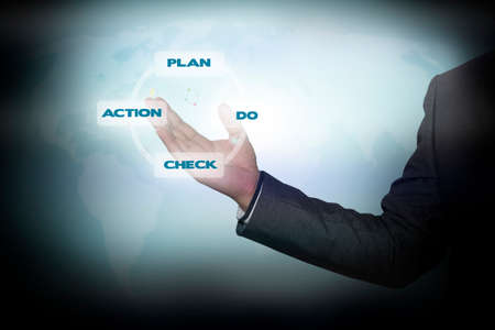 Businessman holding  icon with plan - do - check - action process on the screen. business concept.