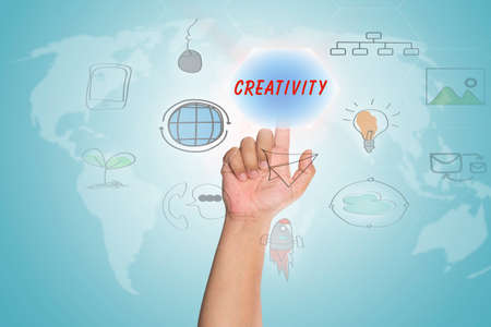 pressing touch screen interface and select "CREATIVITY", business concept , business ideaの写真素材