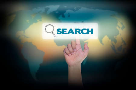 Hand pressing search on virtual screen. business concept.の写真素材