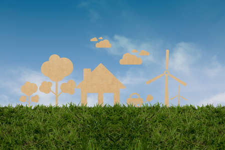Paper cut of eco on green grass,eco, earth, organic, energyの写真素材