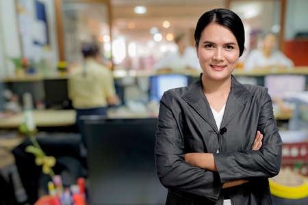 Modern Asian business woman in the office with copy spaceのeditorial素材