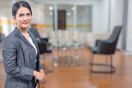 Modern Asian business woman in the office with copy spaceのeditorial素材