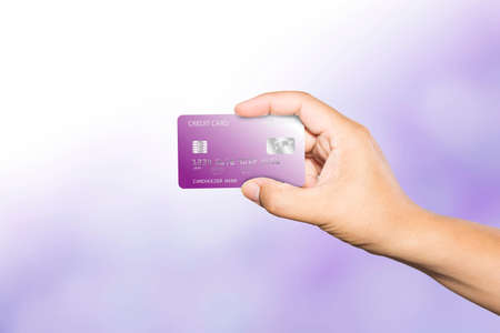 Hand holding credit card , business idea concept